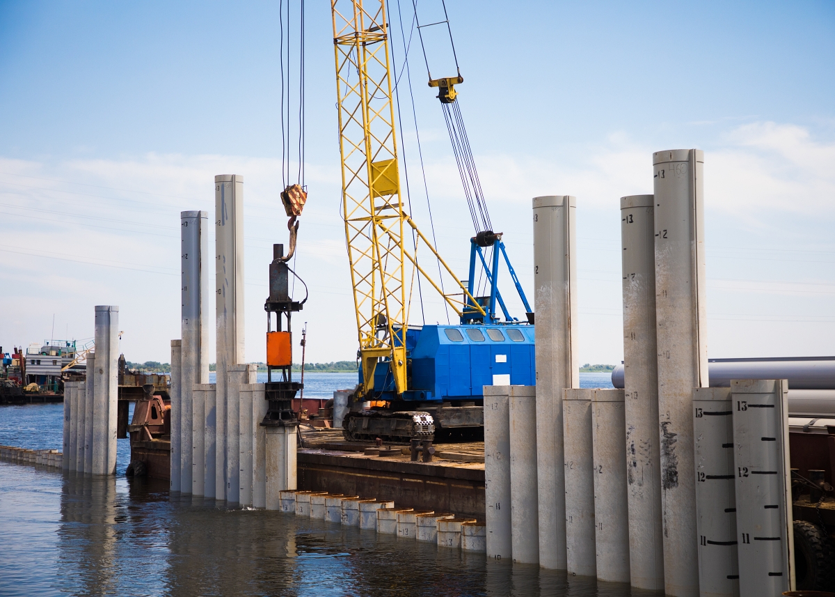 OSHA requires stop blocks on pile-driving leads to prevent the hammer from being raised against the head block. This requirement helps reduce equipment damage and uncontrolled hammer movement.
