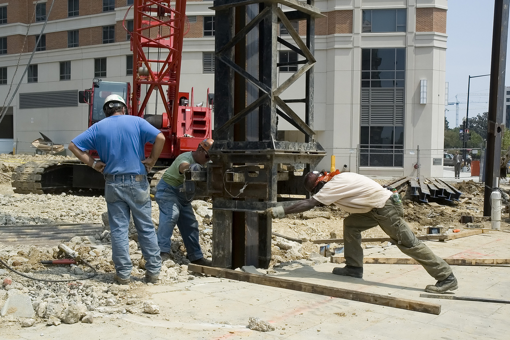 Driven pile installation can provide continuous information through penetration and driving behavior. Drilled shafts shift quality control toward excavation stability, borehole condition, reinforcement placement, and concrete placement because the structural element is created underground.
